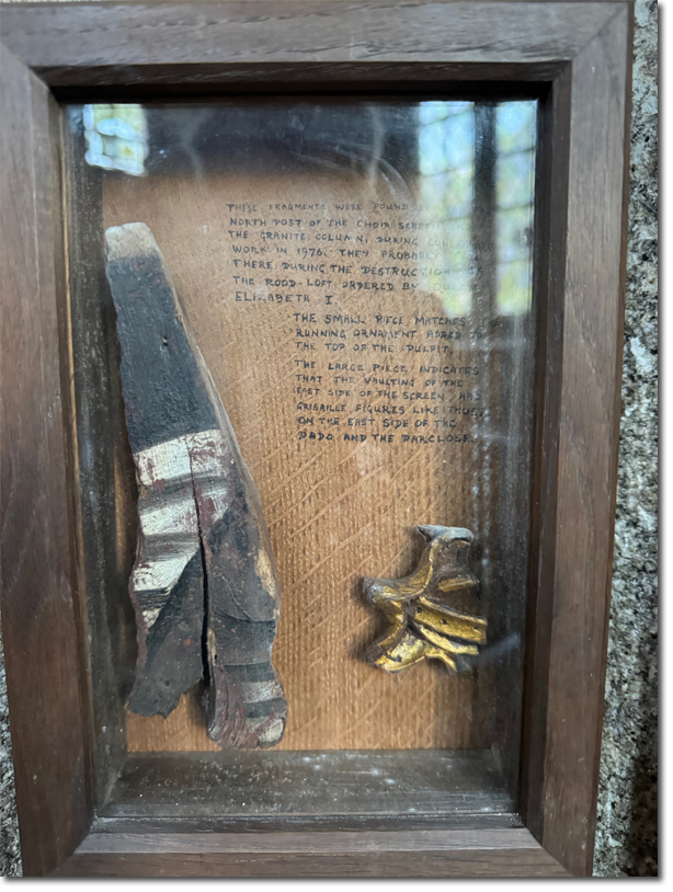 Displayed fragments from the lost rood loft,